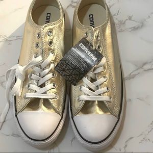 Gold low top converse
